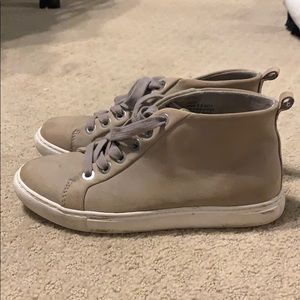 High top tan tennis shoes